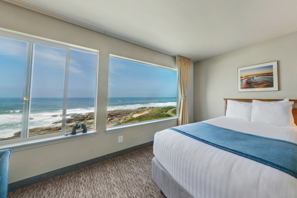 Whale Watcher accommodations at Overleaf Lodge with ocean-facing windows